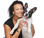 young woman embracing her dog